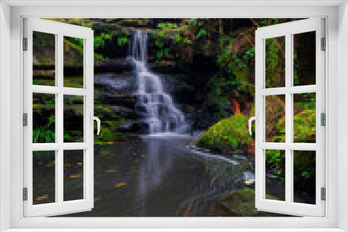 Fototapeta Naklejka Na Ścianę Okno 3D - Beautiful small waterfall in the rainforest.
