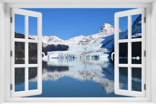 Fototapeta Naklejka Na Ścianę Okno 3D - Spegazzini glacier in a beautiful sunny day, showing vibrant blue ice in contrast with white snow, Argentina