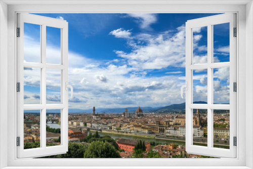 Fototapeta Naklejka Na Ścianę Okno 3D - Beautiful panoramic view of Florence in a sunny day with blue sky and clouds. Italian panorama of a city in Tuscany. Top aerial landscape view of an ancient historical tourist destination in Europe.