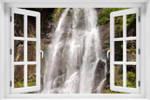 Fototapeta Naklejka Na Ścianę Okno 3D - Makhuntseti waterfall, one of the highest waterfalls in Ajara. Point in a Acharistsqali river, where water flows over a vertical drop or a series of steep drops