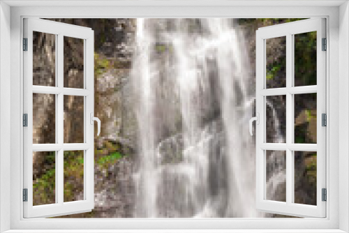 Fototapeta Naklejka Na Ścianę Okno 3D - Makhuntseti waterfall, one of the highest waterfalls in Ajara. Point in a Acharistsqali river, where water flows over a vertical drop or a series of steep drops