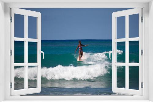 Fototapeta Naklejka Na Ścianę Okno 3D - Charming curly African-American dark-skinned young woman, professional surfer ride a surfboard in the ocean