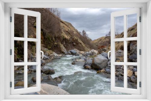 Fototapeta Naklejka Na Ścianę Okno 3D - view of a winding mountain river