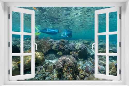 Fototapeta Naklejka Na Ścianę Okno 3D - Indonesia, West Papua, Raja Ampat. Snorkelers survey reefs.