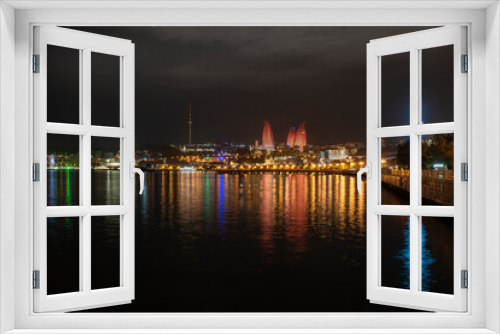 Fototapeta Naklejka Na Ścianę Okno 3D - night photo of the waterfront of Baku, Azerbaijan, with the famous flame towers
