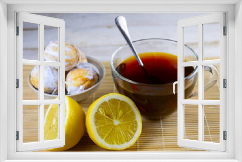 Fototapeta Naklejka Na Ścianę Okno 3D - image of cookies, cups of tea, teapot with tea and lemon on a wooden table
