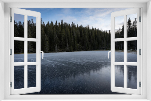 Fototapeta Naklejka Na Ścianę Okno 3D - a frozen lake up in the totenåsen hills