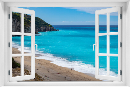 Fototapeta Naklejka Na Ścianę Okno 3D - Azure vibrant waves on coast of Lefkada island. Mylos sandy idyllic beach in Greece. Summer nature travel to Ionian Sea