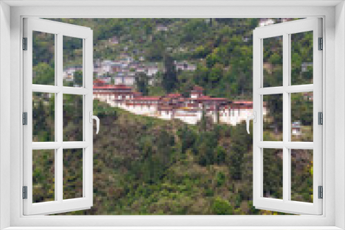 Fototapeta Naklejka Na Ścianę Okno 3D - View at Trongsa Dzong monastery in the green mountains in Central Bhutan, Bhutan, Asia