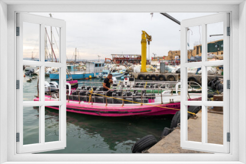 Fototapeta Naklejka Na Ścianę Okno 3D - Yachts, fishing and tourist boats at the port in Acre old city, in northern Israel