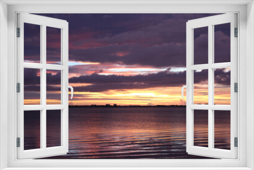 Fototapeta Naklejka Na Ścianę Okno 3D - Orange and Pink Sunset Skyline Over Ocean. Cloudy Dramatic Sunset Sky. 
