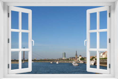 Fototapeta Naklejka Na Ścianę Okno 3D - Düsseldorf mit Oberkasseler Brücke