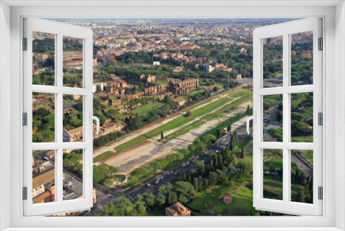 Fototapeta Naklejka Na Ścianę Okno 3D - Aerial drone photo of iconic Circus Maximus a green space and remains of a stone - marble arena used for chariot races built next to Palatine hill and world famous Colosseum, historic Rome, Italy