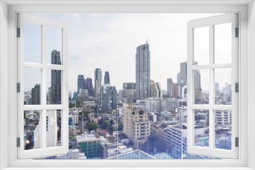 Fototapeta Naklejka Na Ścianę Okno 3D - Financial stock chart hologram over panorama city view of Bangkok, business center in Southeast Asia. The concept of international transactions. Double exposure.