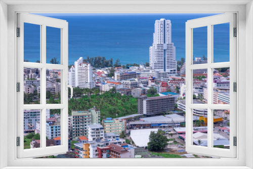 Fototapeta Naklejka Na Ścianę Okno 3D - view of Patong and patong beach with the buildings and high-rise hotels and resorts in the background Kathu phuket Thailand 