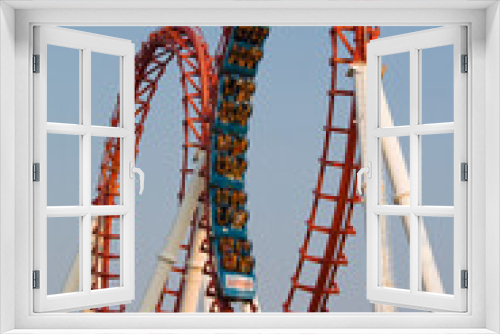 Fototapeta Naklejka Na Ścianę Okno 3D - The scaring loops of a roller coaster.