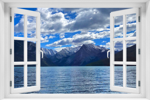 Fototapeta Naklejka Na Ścianę Okno 3D - Lake Minnewanka Rocky Mountains and blue sky