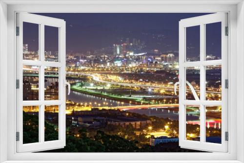 Fototapeta Naklejka Na Ścianę Okno 3D - Aerial panorama of Taipei Downtown at night with Dazhi Bridge over Keelung River, parks and highways along the riverside and skyscrapers in Nangang area at dusk ~ A romantic night scape of Taipei City
