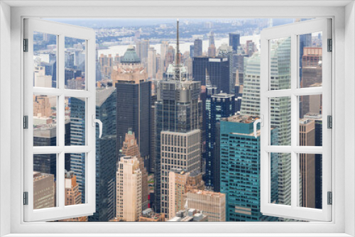 Fototapeta Naklejka Na Ścianę Okno 3D - Aerial panoramic city view of Time Square area, Manhattan West Side neighborhoods and the Hudson River view with New Jersey bank, New York city, USA. Iconic cityscape of building exteriors of NYC