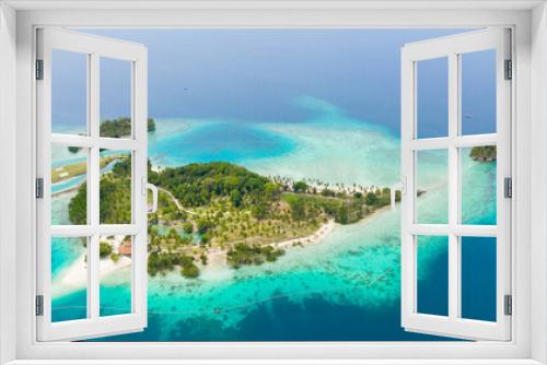 Fototapeta Naklejka Na Ścianę Okno 3D - Aerial drone of Seascape with beautiful beach and tropical Malipano island with palm trees by coral reef from above. Philippines, Samal.