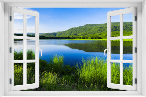 Fototapeta Naklejka Na Ścianę Okno 3D - Peaceful lake in the afternoon, Reservoir in countryside of Thailand