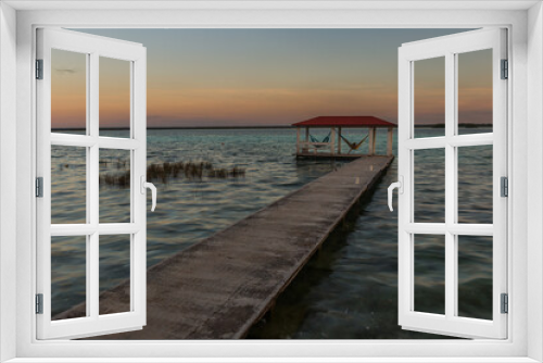 Fototapeta Naklejka Na Ścianę Okno 3D - Caribbean sunset scene at Bacalar lagoon, Mexico