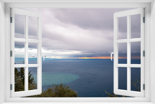 Fototapeta Naklejka Na Ścianę Okno 3D - Ocean, sunset, and gray storm clouds offshore, Tyrrhenian Sea, Amalfi Coast, Italy