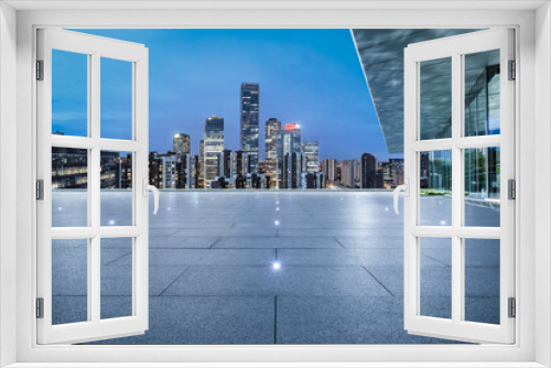 Fototapeta Naklejka Na Ścianę Okno 3D - Panoramic skyline and modern commercial office buildings with empty square floors in Beijing at night