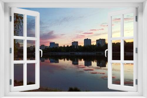 Fototapeta Naklejka Na Ścianę Okno 3D - Evening Town