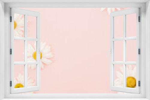 Fototapeta Naklejka Na Ścianę Okno 3D - Elegant chamomile daisy flower buds on pastel pink background with blank mockup copy space. Flat lay, top view brand, blog, website, social media template