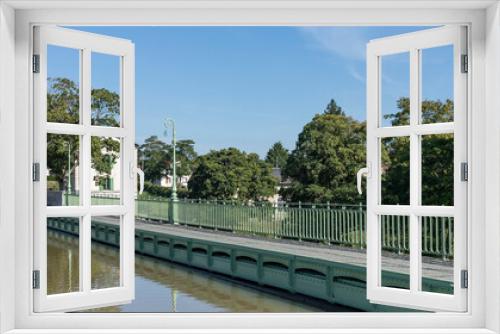 Fototapeta Naklejka Na Ścianę Okno 3D - Ornate canal bridge with railings crossing the Loire River