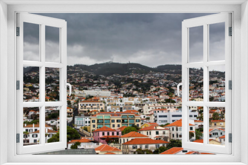 Fototapeta Naklejka Na Ścianę Okno 3D - View of the city of Funchal, Madeira
Mountains and houses on the background.