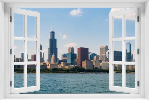 Fototapeta Naklejka Na Ścianę Okno 3D - A picturesque view of Downtown skyscrapers of Chicago skyline panorama over Lake Michigan at daytime, Chicago, Illinois, USA