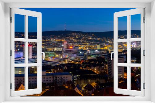 Fototapeta Naklejka Na Ścianę Okno 3D - Stuttgart Cauldron nighttime panorama. Illuminated town at winter evening blue hour with hundreds of lights. Capital and largest city of the German state of Baden-Württemberg.  Cradle of automobile.