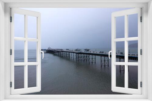 Fototapeta Naklejka Na Ścianę Okno 3D - Pier. United Kingdom, Wales in late winter.