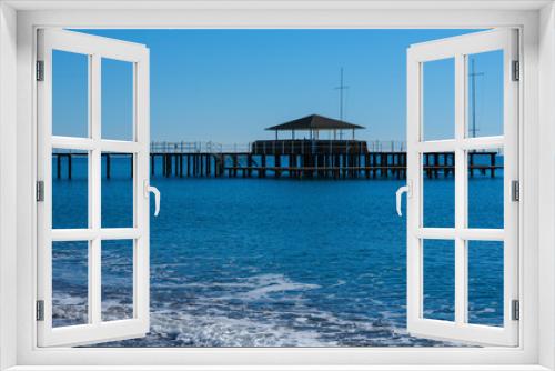 Fototapeta Naklejka Na Ścianę Okno 3D - a pier on the beach and calming sea views