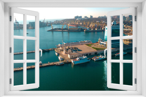 Fototapeta Naklejka Na Ścianę Okno 3D - Industrial port in the field of import-export global business logistics and transportation, Loading and unloading container ships, cargo transportation from a bird's eye view.