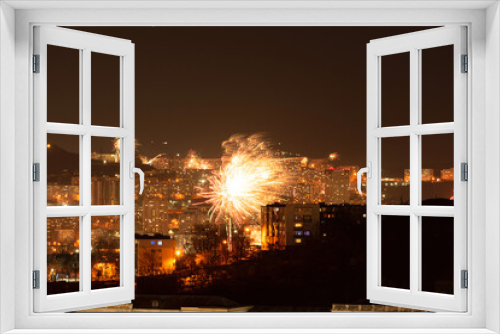 Fototapeta Naklejka Na Ścianę Okno 3D - Fireworks in the city at night during New Year celebration. Soft focus background