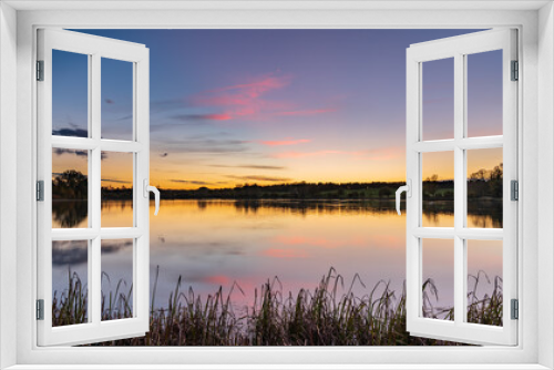Fototapeta Naklejka Na Ścianę Okno 3D - Willen lake at sunset in Milton Keynes. England