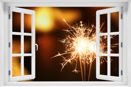 Fototapeta Naklejka Na Ścianę Okno 3D - Beautiful sparklers against blurred lights