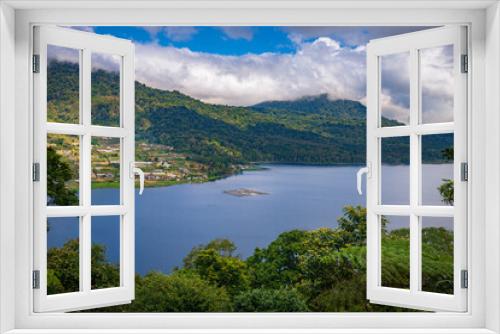 Fototapeta Naklejka Na Ścianę Okno 3D - A panoramic view on Buyan lake from the Buyan lake viewpoint on Bali island in Indonesia