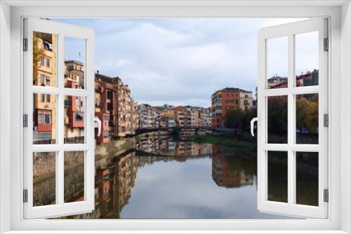 Fototapeta Naklejka Na Ścianę Okno 3D - Colourfull houses along the river Onyar in Girona, Spain. 