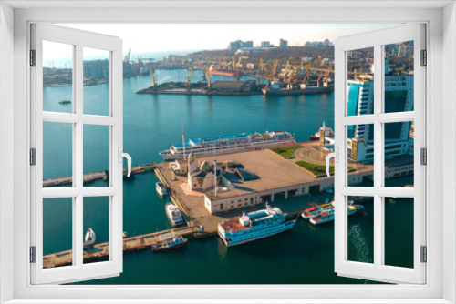 Fototapeta Naklejka Na Ścianę Okno 3D - Industrial port in the field of import-export global business logistics and transportation, Loading and unloading container ships, cargo transportation from a bird's eye view.