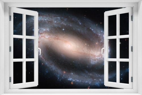 Fototapeta Naklejka Na Ścianę Okno 3D - Barred spiral galaxy NGC 1300 photographed by Hubble telescope.