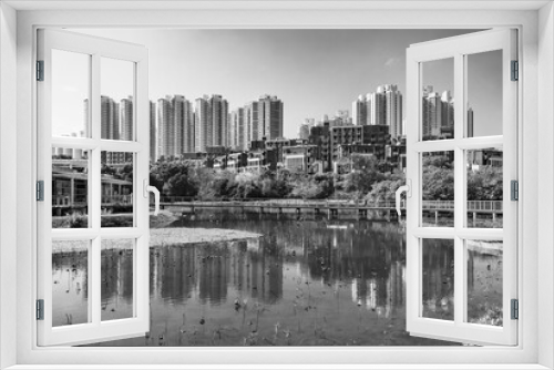 Fototapeta Naklejka Na Ścianę Okno 3D - High rise residential building and Hong Kong Wetland Park