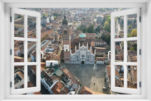 Aerial view of facade of the ancient Duomo in Monza (Monza Cathedral). Drone photography of the main square with church in Monza in north Italy, Brianza, Lombardia.