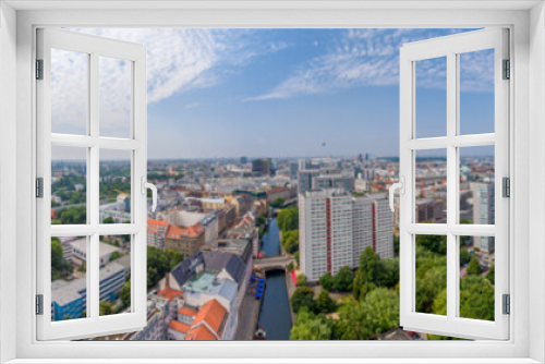 Fototapeta Naklejka Na Ścianę Okno 3D - BERLIN, GERMANY - JULY 24, 2016: Panoramic aerial view of Berlin skyline at sunset with major city landmarks along Spree river.