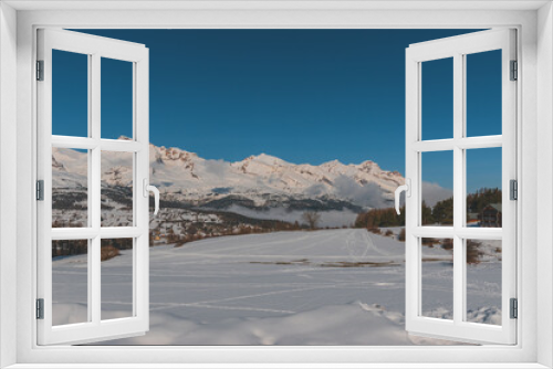 Fototapeta Naklejka Na Ścianę Okno 3D - A picturesque landscape view of the French Alps mountains on a cold winter day (La Joue du Loup, Devoluy)