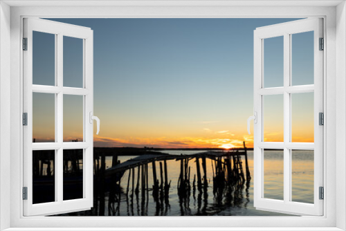 Fototapeta Naklejka Na Ścianę Okno 3D - sunset at Comporta wooden pier in Portugal
