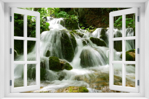 Fototapeta Naklejka Na Ścianę Okno 3D - Kaskadenförmiger Wasserfall
